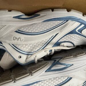 White and Blue Athletic Shoes